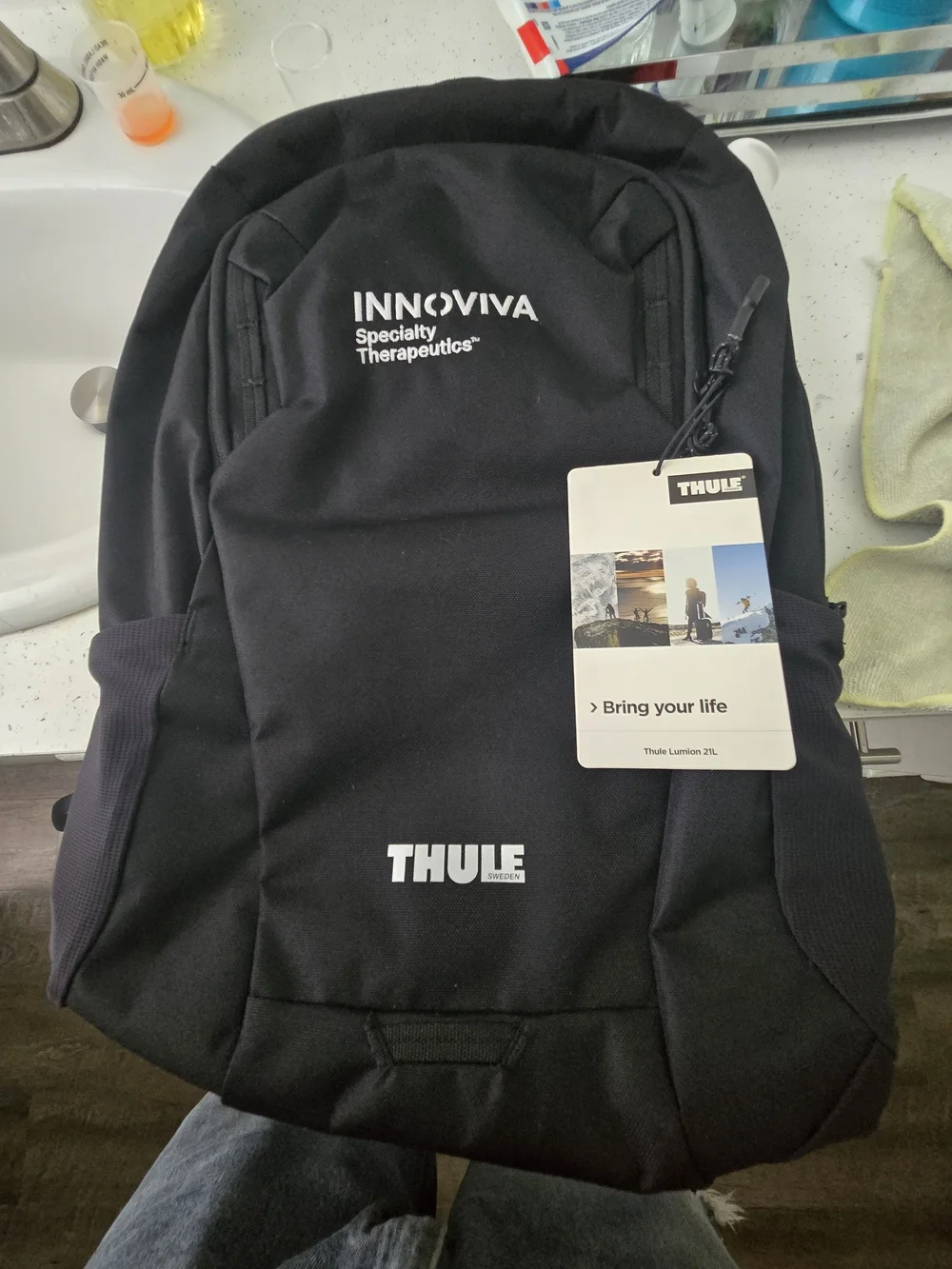 Thule Black Backpack with Innoviva Specialty Therapeutics Logo